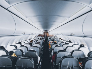 Aerial view of an airplane aisle and seats.